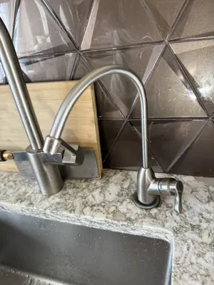 New faucet installation and plumbing connection