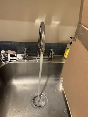 New faucet installation and plumbing connection