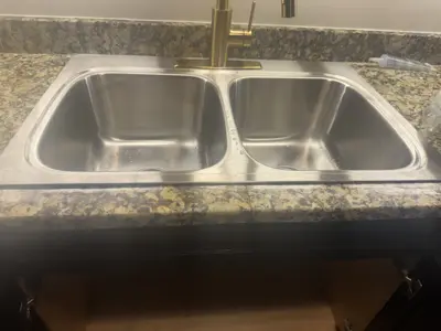 Sink installation with plumbing hookup
