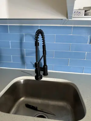 New faucet installation and plumbing connection