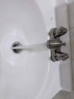 New faucet installation with plumbing connection