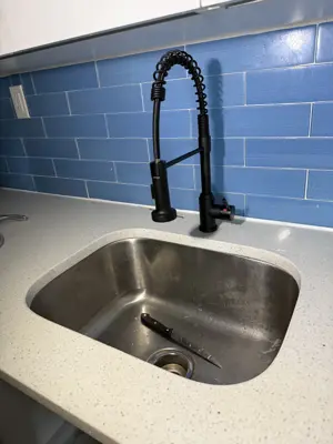 New faucet installation and plumbing connection