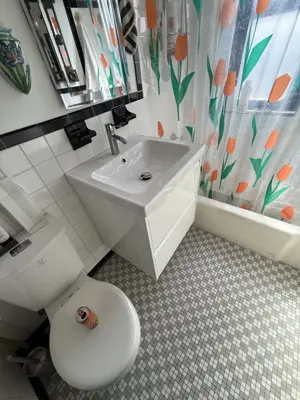Sink and vanity installation in a NYC bathroom
