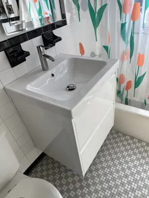 Sink and vanity installation in a NYC bathroom
