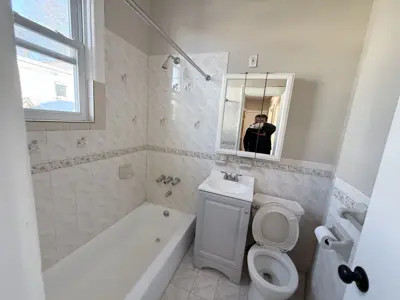 Sink and vanity installation in a NYC bathroom