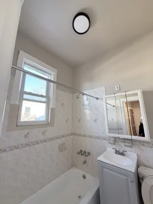 Sink and vanity installation in a NYC bathroom