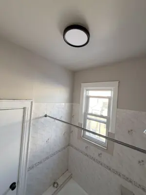 Sink and vanity installation in a NYC bathroom