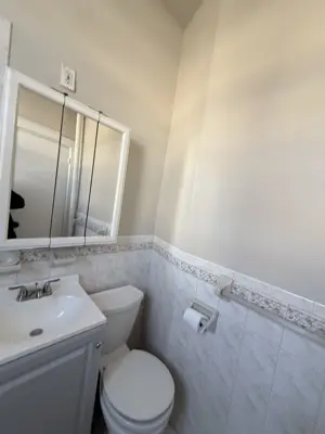Sink and vanity installation in a NYC bathroom
