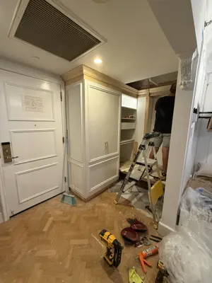 Curtain rod installation in a NYC home