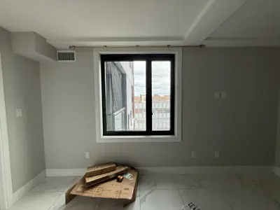 Curtain rod installation in a NYC home