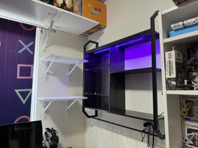 Floating shelf installation on apartment wall