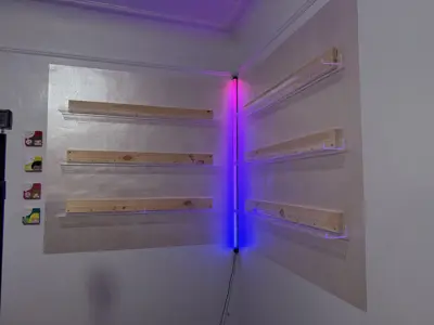 Floating shelf installation on apartment wall