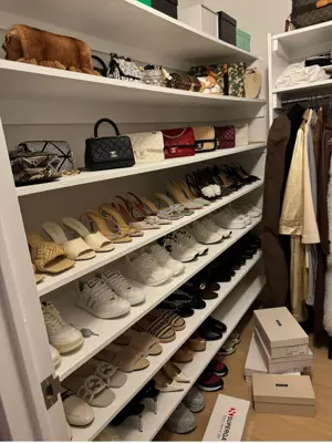 Floating shelf installation on apartment wall