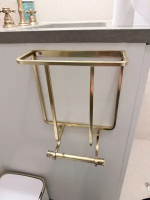 Floating shelf installation on apartment wall